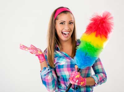 happy woman holding rainbow dust brush optimized